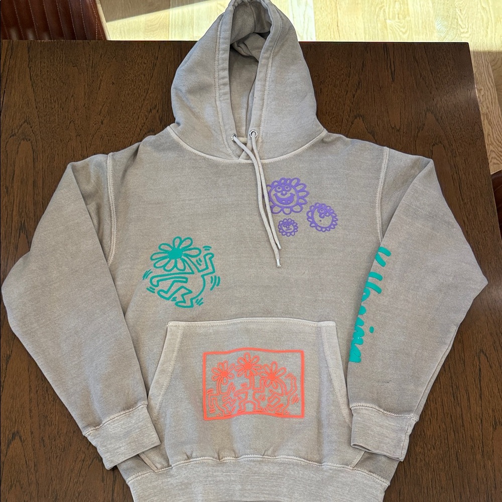 Tan Hoodie with Colorful Graphic Accents
